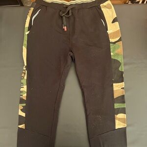 Black/Camouflage joggers. Large. New. Never worn.